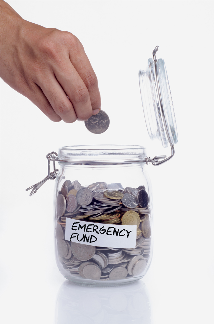 Image showing a jar with a label emergency fund and coins inside