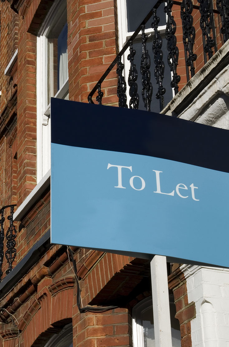 Image showing a "To let" sign on the side of a house