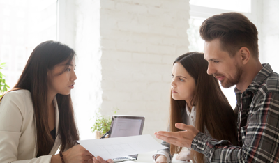 Image of a couple talking to an adviser