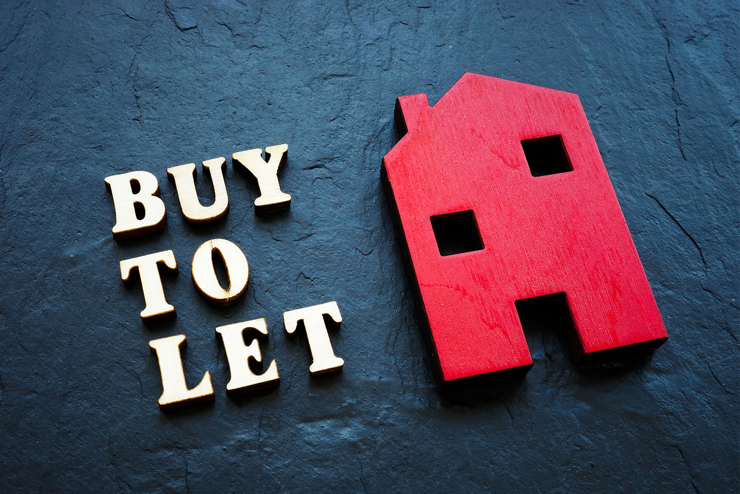 Image showing the words "Buy-to-let" next to a model house