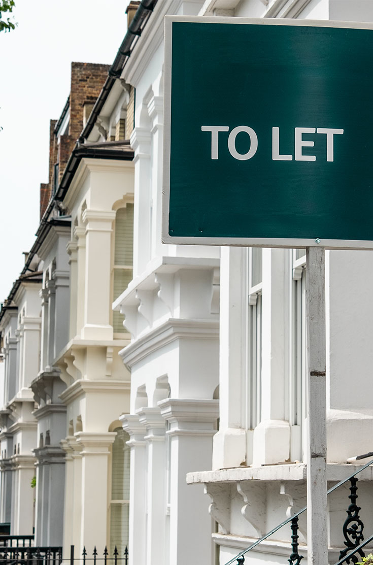 Image showing a "To let" sign on the side of a house