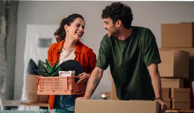 Image showing a young couple unpacking in a new home