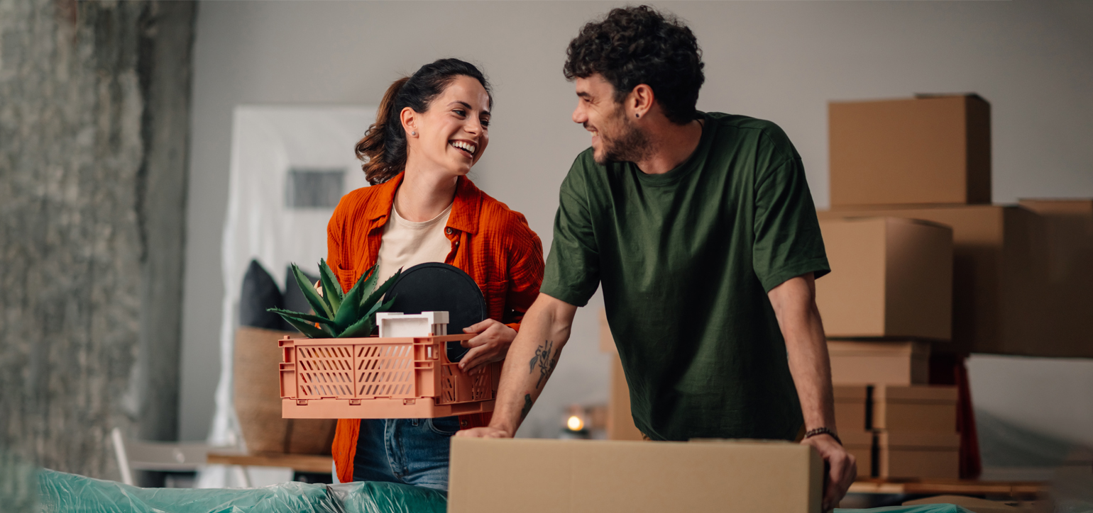 Image showing a young couple unpacking in a new home